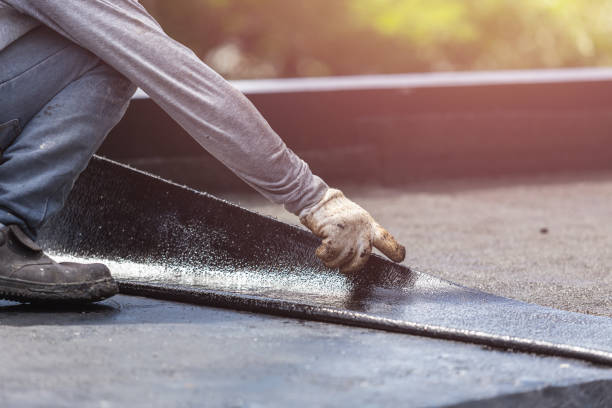 Professional Basement Waterproofing technician working in Trenton, TN